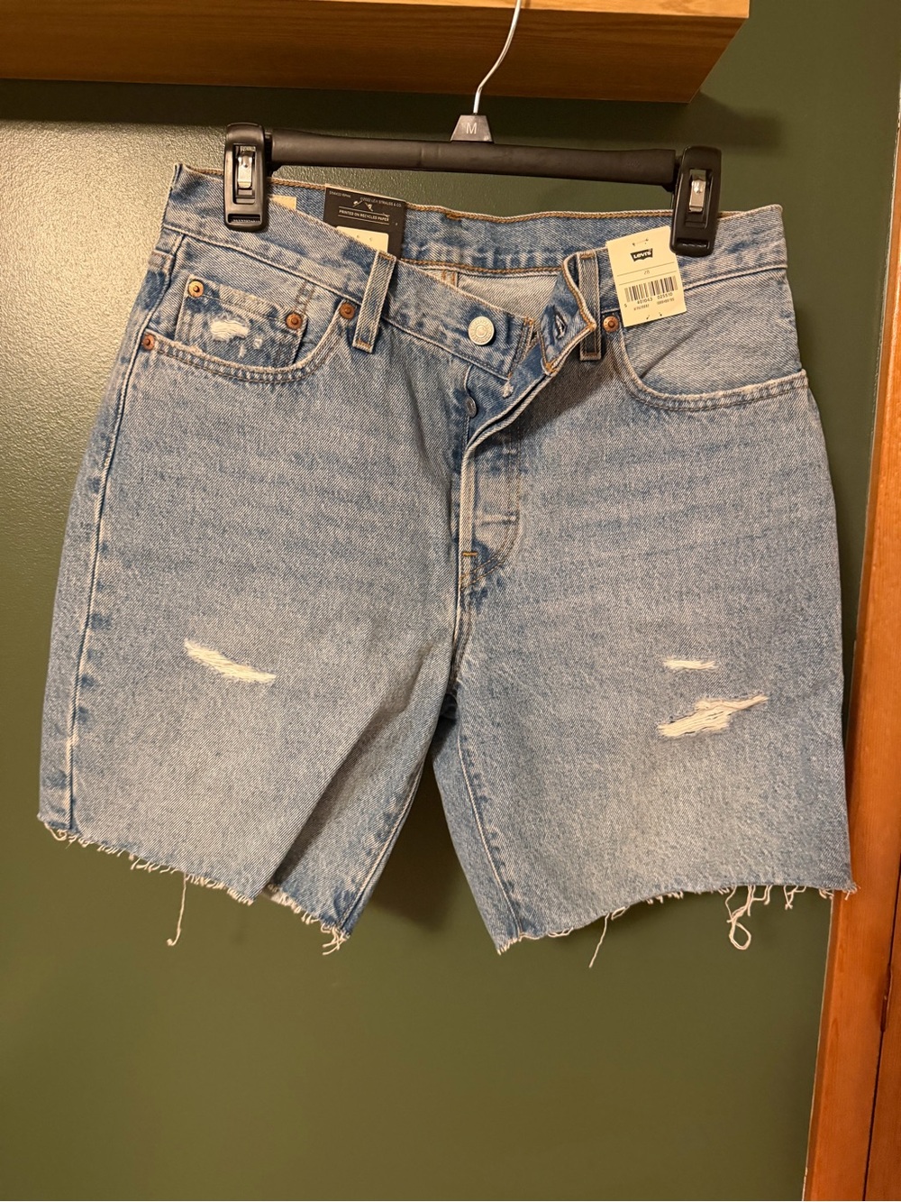 Levi’sLight Blue Distressed Denim Shorts